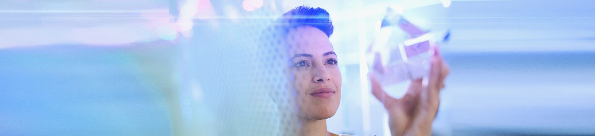 Woman holding a prism