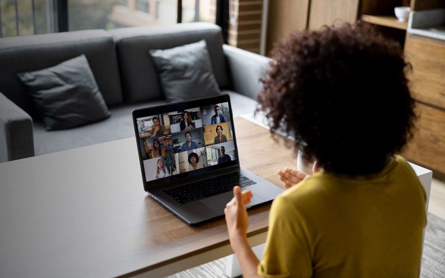 A woman on a teams meeting call online