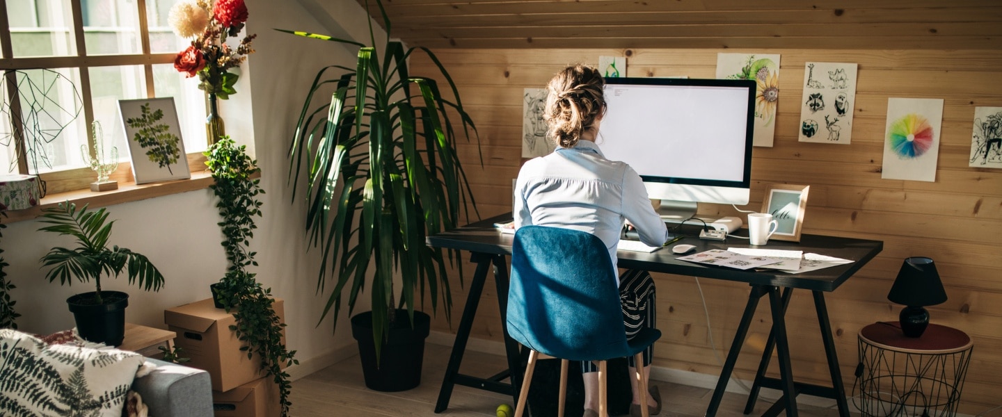 A woman working from her home office