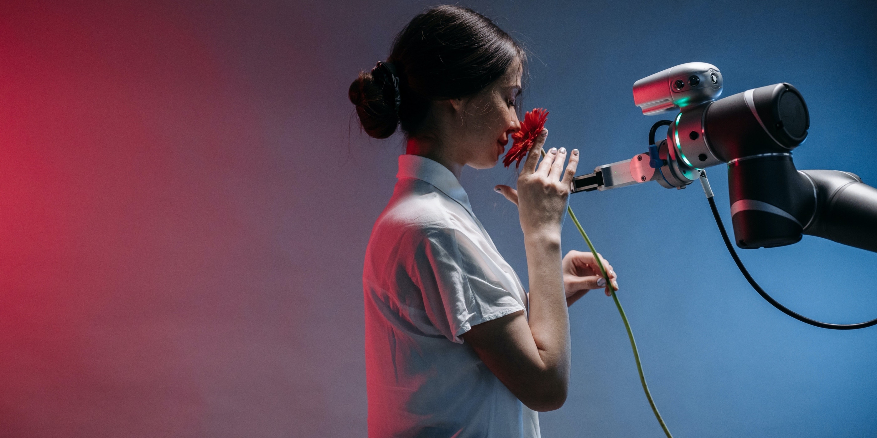Lady smelling a flower on a photo shoot